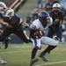 Pioneer junior Darius Sanderford makes a move during a punt return against Saline High School on Friday. Daniel Brenner I AnnArbor.com